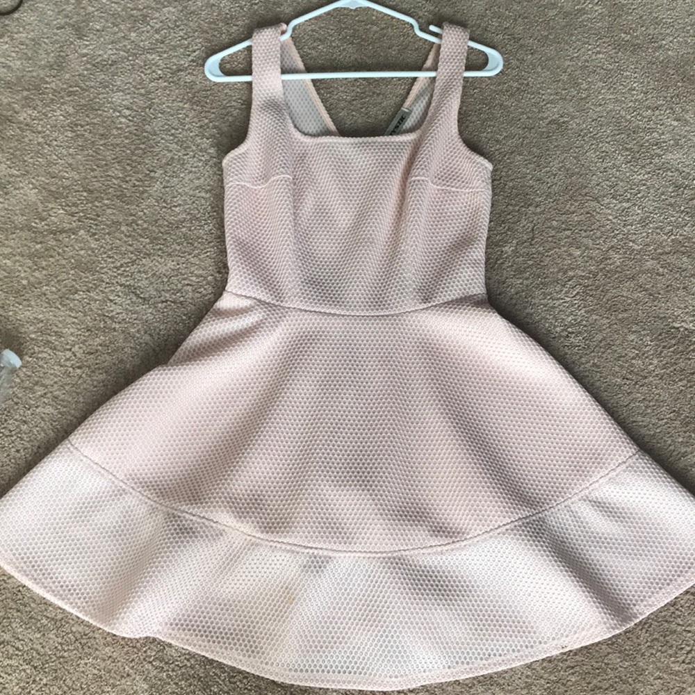 Mystic light pink net fabric dress.